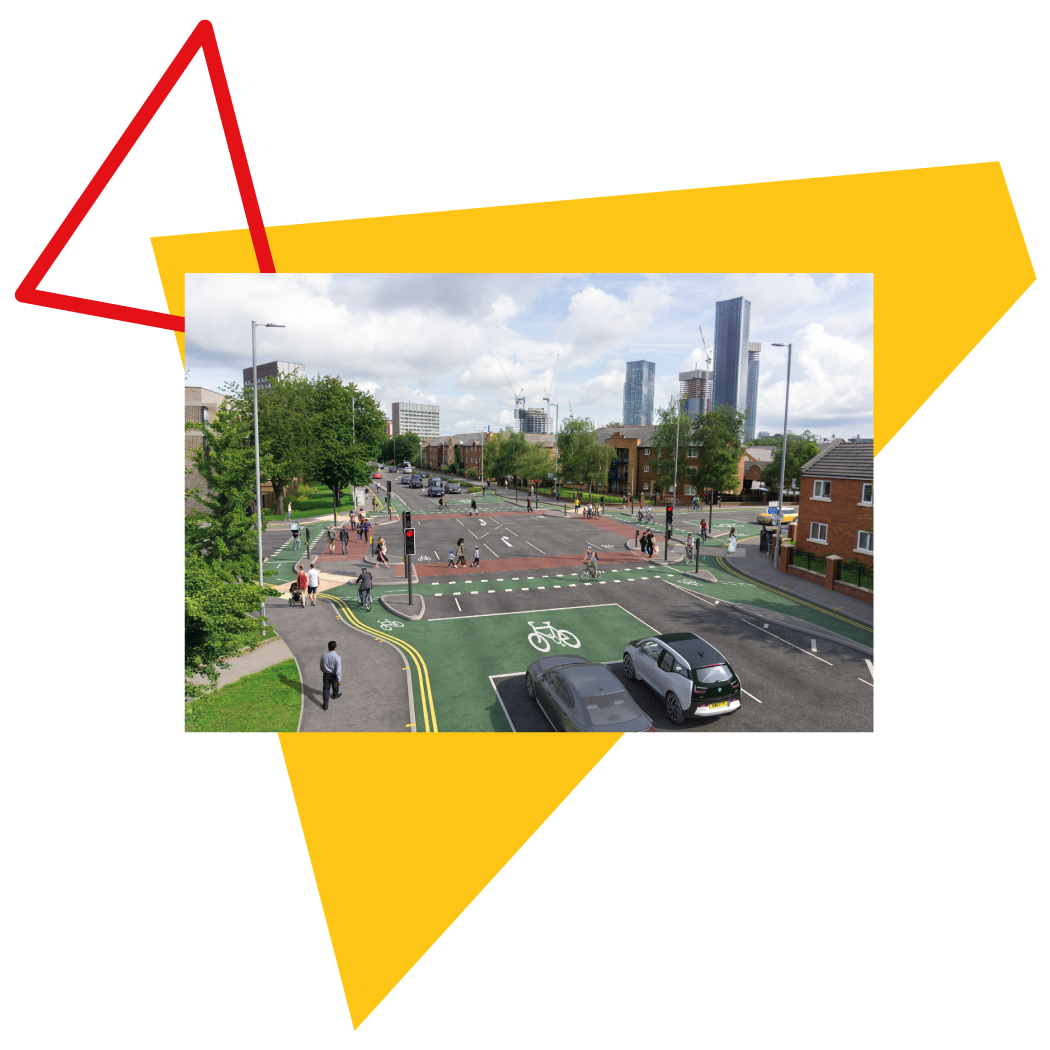 A multi-use traffic junction with protected cycle lanes and pedestrain crossings alongside vehicles